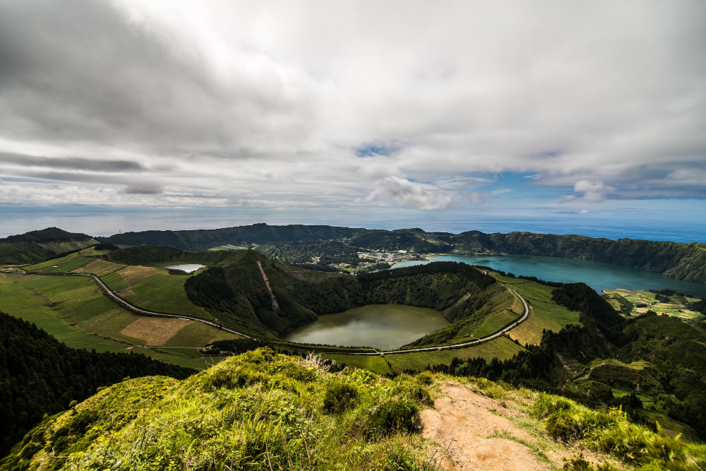 Quiet island destination in the Azores with volcanic landscapes, green hills, and ocean views, ideal for peaceful island getaways and nature escapes