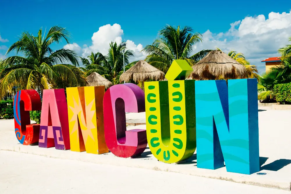 Cancun beach with turquoise water and white sand, ideal destination for first-time international travelers