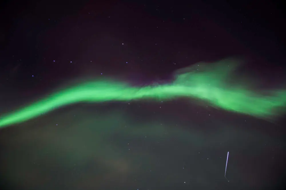 Trending European destinations featuring a calm lake and autumn colors near Oulu, Finland.