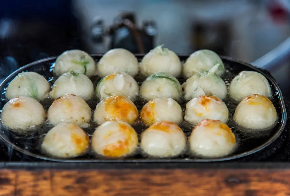 Osaka for first-time visitors trying takoyaki street food