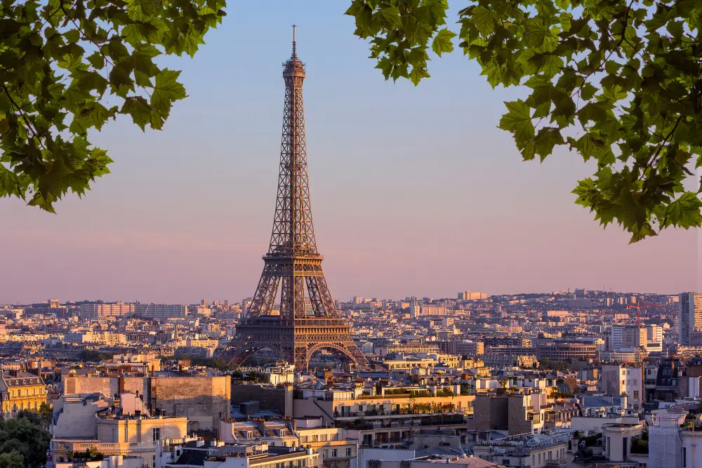 Paris travel guide for first-time visitors featuring the Eiffel Tower skyline