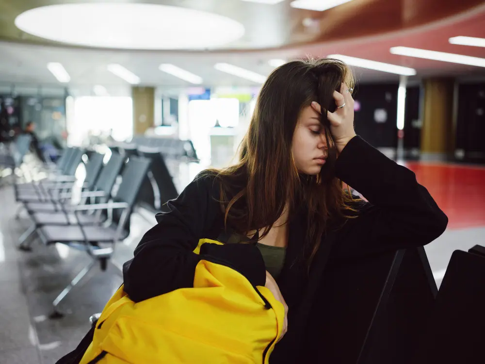 Step-by-step guide for travelers dealing with a delayed or canceled flight at the airport