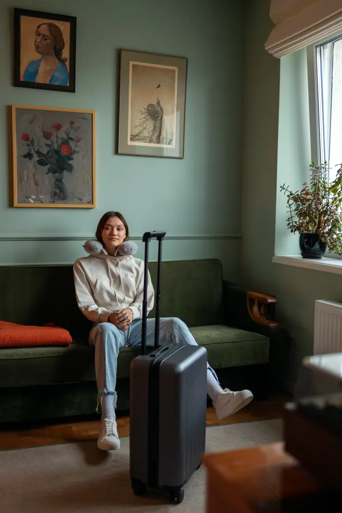 Traveler booking a hotel online with free cancellation for a flexible travel plan