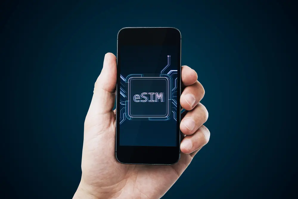 Traveler activating an eSIM on a smartphone for instant mobile data while traveling internationally