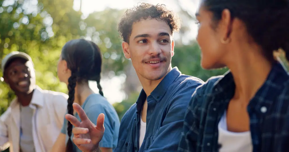 Traveler having genuine conversation with local resident receiving authentic recommendations and building meaningful cross-cultural connection