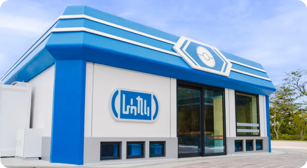 Friendly Shop building in Sedge Town at PokéPark KANTO featuring Pokémon-themed shopping area