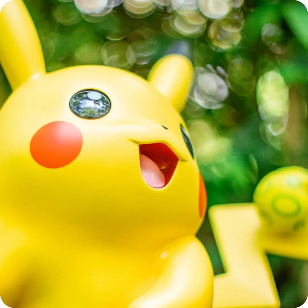 Close-up of Pikachu in Pokémon Forest at PokéPark KANTO surrounded by greenery and natural light