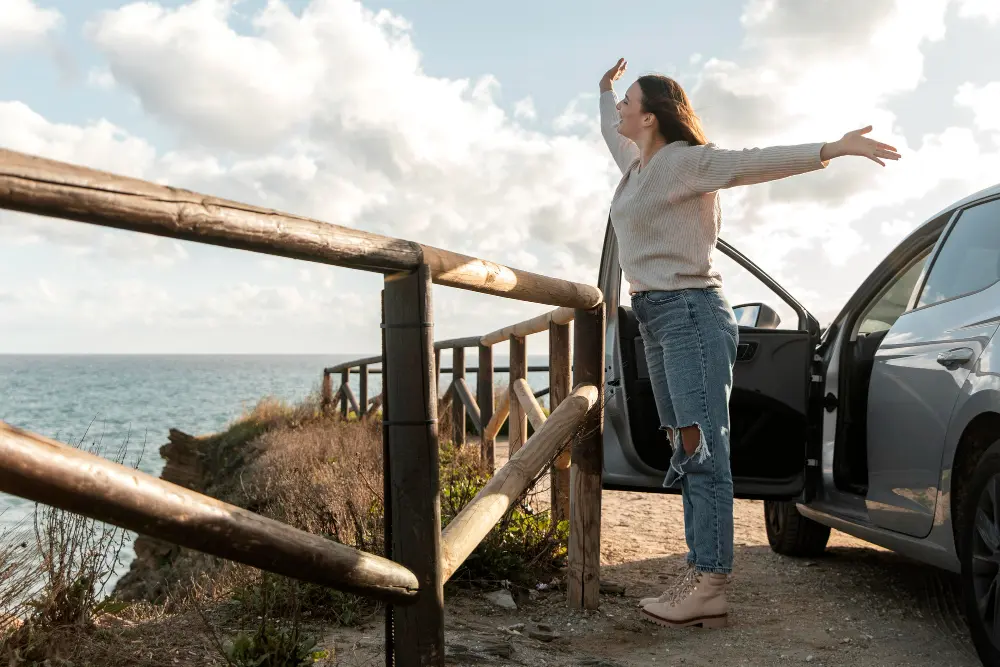 Travelers enjoying scenic mountain highway road stops during a well-planned road trip
