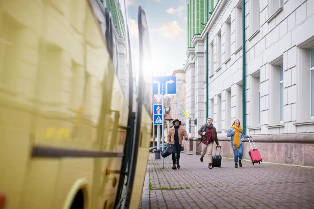 Traveler organizing expenses into transportation, accommodation, food, and activities inside a travel budget planner spreadsheet