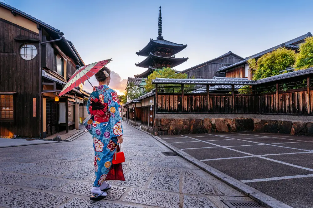 A colorful view of the Tokyo skyline and Mount Fuji, illustrating how much is to travel to japan.